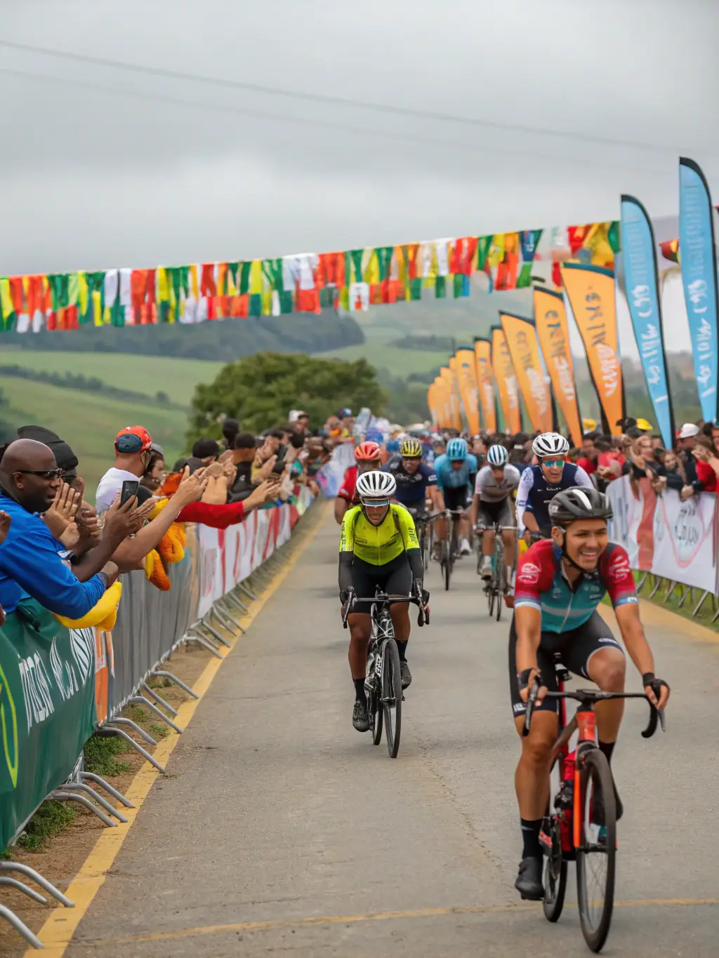A lively scene of cyclists participating in a community cycling event, with banners, music, and a festive atmosphere.